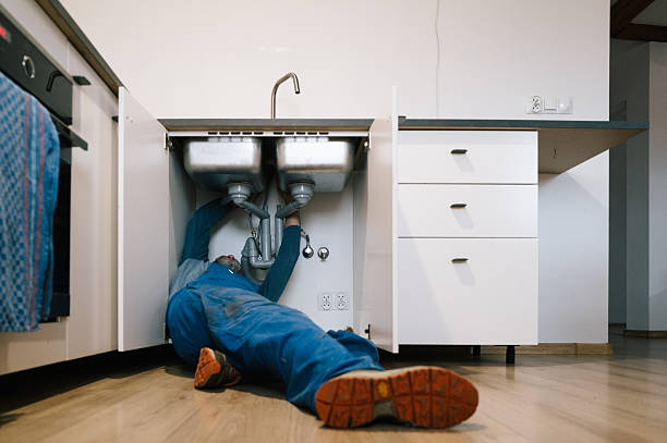 Professional Drain Cleaning technician working in Sand Lake, MI